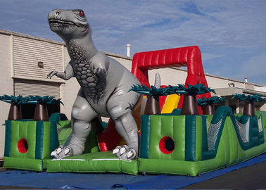 Corsa ad ostacoli gonfiabile del dinosauro giurassico stupefacente del superstite, corsa ad ostacoli del bambino