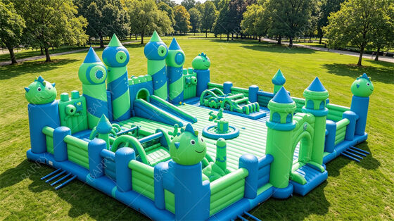Parco giochi gonfiabile per dinosauri di livello commerciale - Grande castello a rimbalzo con percorso di ostacoli e scivolo, perfetto per affitto di feste, parchi di divertimento ed eventi