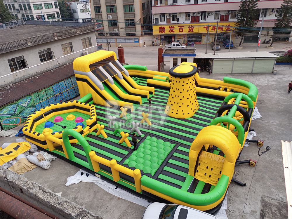 Giant Outdoor Water Dry Inflatable Theme Park National Indoor Big Bounce House With Wipe Out Game Slide Parete di arrampicata