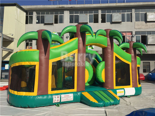 Campo da giuoco gonfiabile di tema del castello 0.55mm del PVC della giungla gonfiabile commerciale tropicale di divertimento